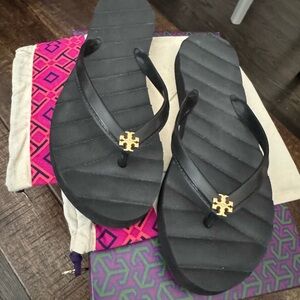 Tory Burch Black and Gold Kira Flip Flops